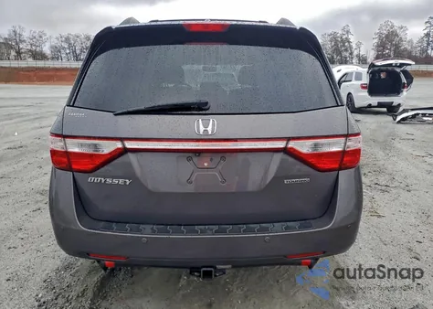 2012 Honda Odyssey Touring z USA, uszkodzony, nr VIN 5FNRL5H99CB043322